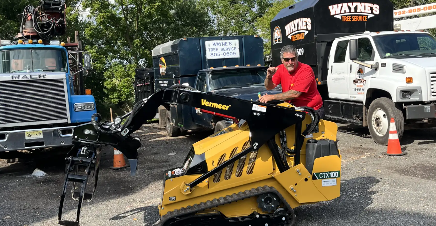 Wayne's Tree Service crew and trucks on a job site in Somerville, NJ