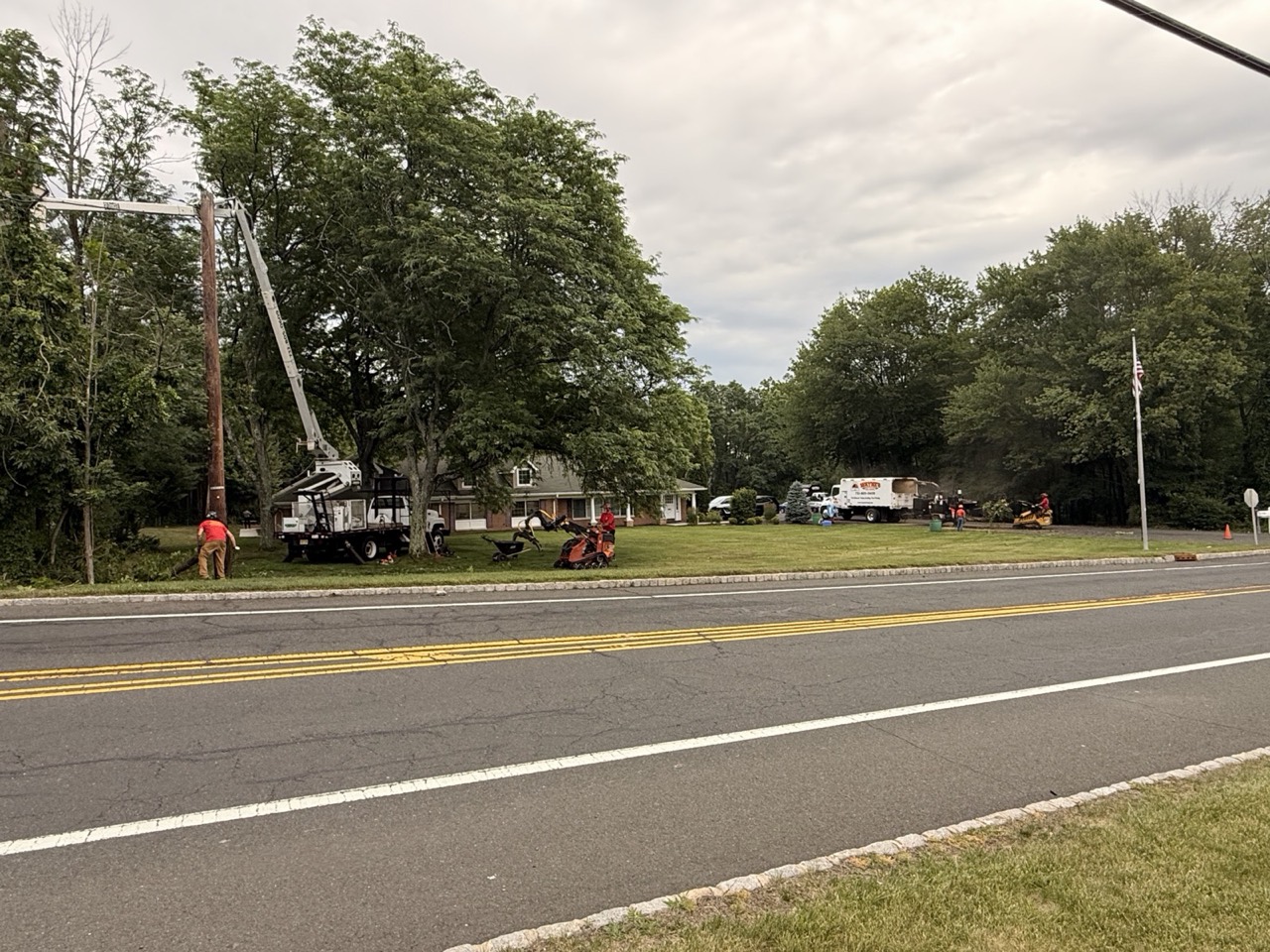 Crew trucks working along a roadside