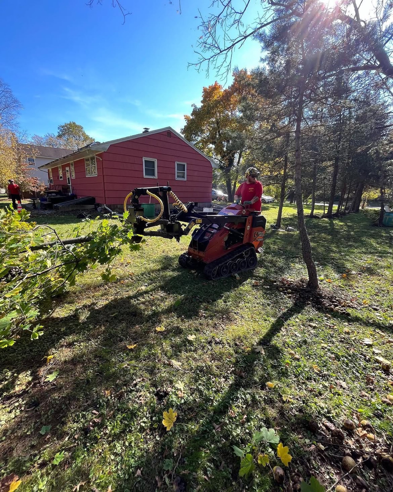 Wayne's crew operating compact clearing equipment